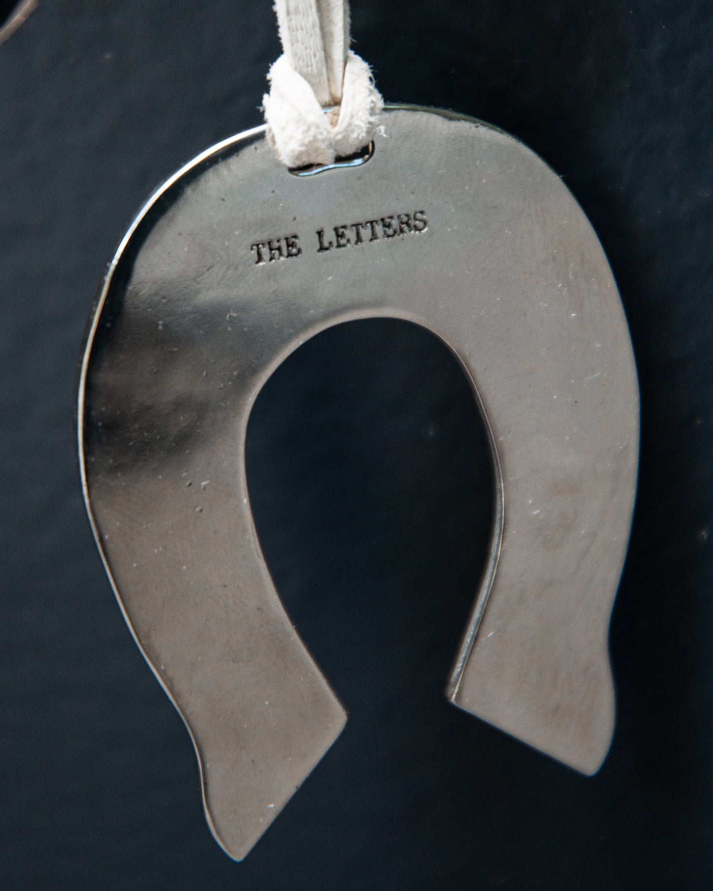 HORSESHOE EMBROIDERY PENDANT